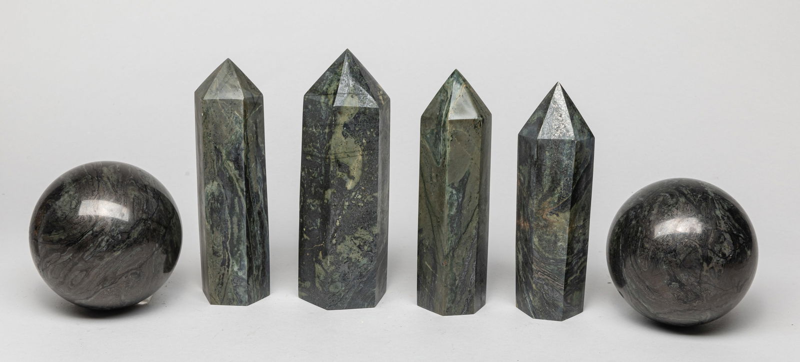 Collectible Gemstone Obelisks & Balls: Including 4 gemstone carved obelisks and 2 large balls. Size varies.