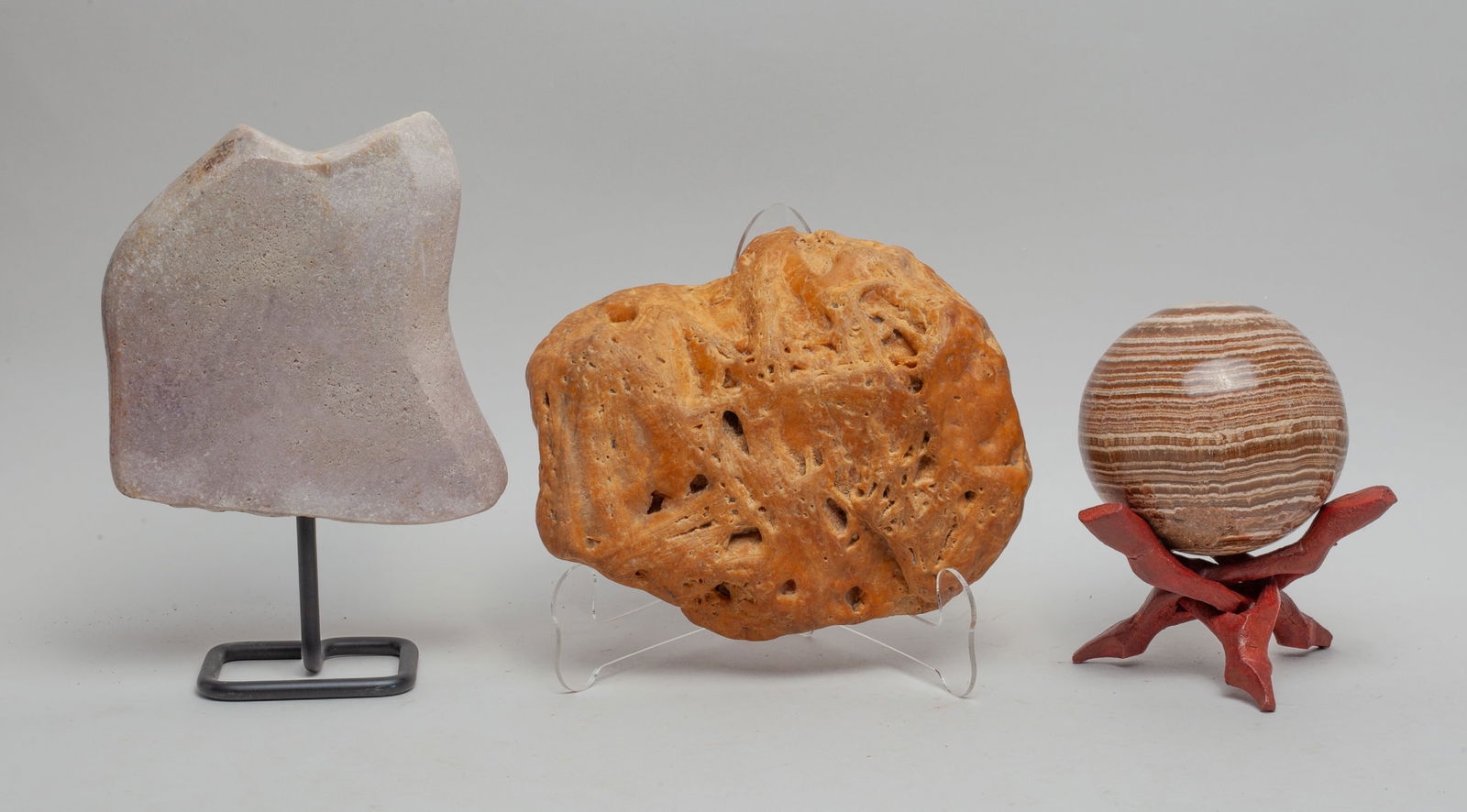 Dinosaur Bone Slab & Petrified Wood Ball: Including a dinosaur bone slab, a petrified wood ball and a large stone sculpture. Size varies.