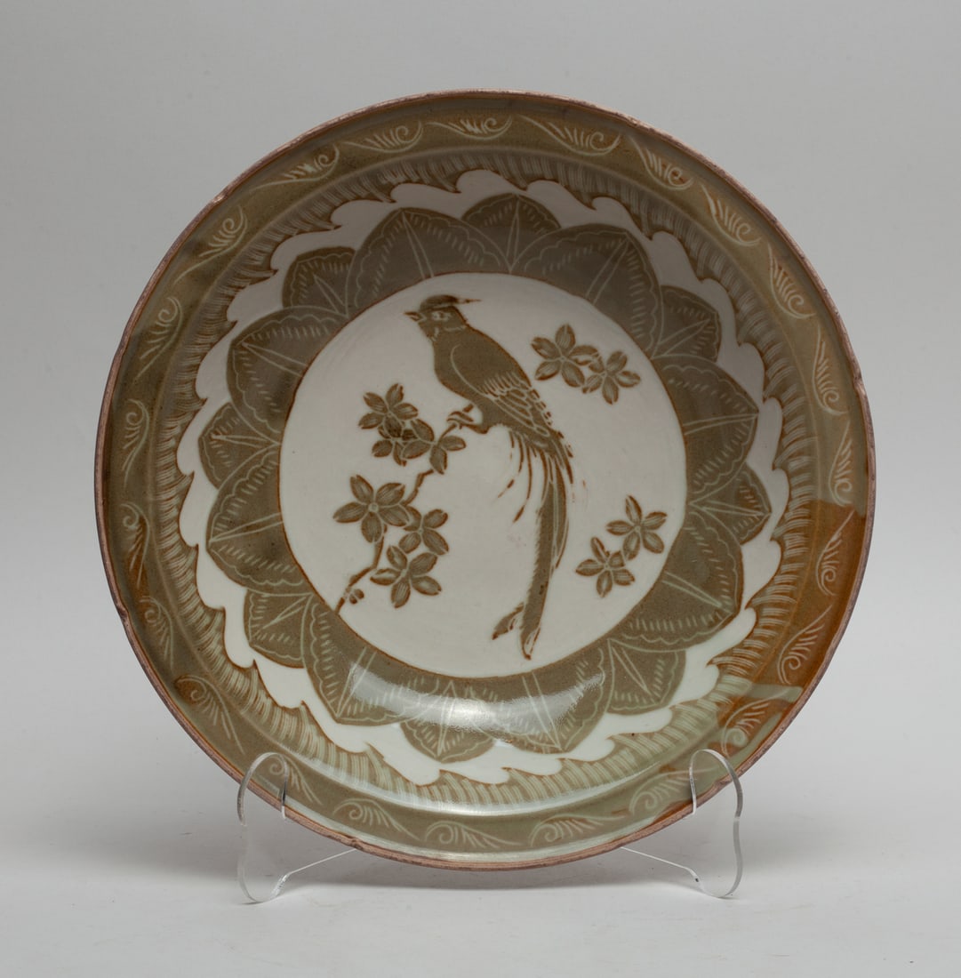 Large Korean Porcelain Bowl: The bowl interior centre painted with bird and flowers, framed by leaves, glazed in white and olive-green colors. Approx. 10.7-2.4 inch.