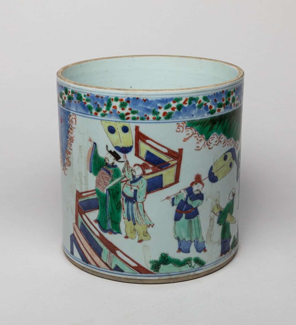 Chinese Famille Rose Porcelain Brush Pot: Of cylindrical form, the exterior painted with a continuous scene of figures in various activities. Approx. 7.5-7.3 inch. The Estate of DTLA Store Closed Sale, 2023