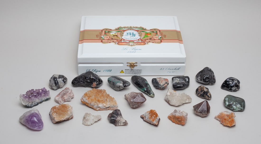 Estate Box of Amethyst, Garnet & Crystals: Collection of amethyst, garnet and crystal stone sculptures, with box. Size varies.