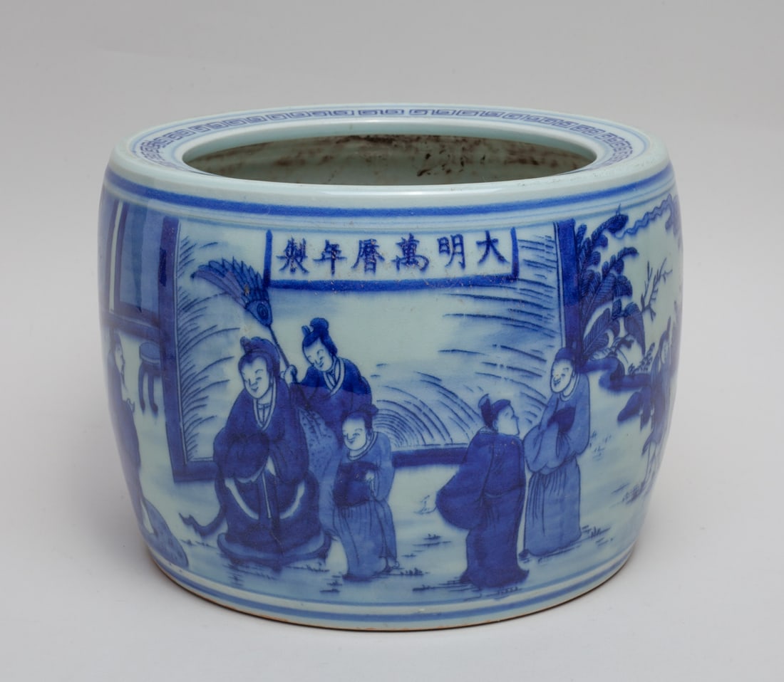 Chinese Blue & White Porcelain Pot: Of drum form, the exterior painted with figures in various activities in outdoor setting, marked with six characters on the rim. Approx. 9-6.7 inch.