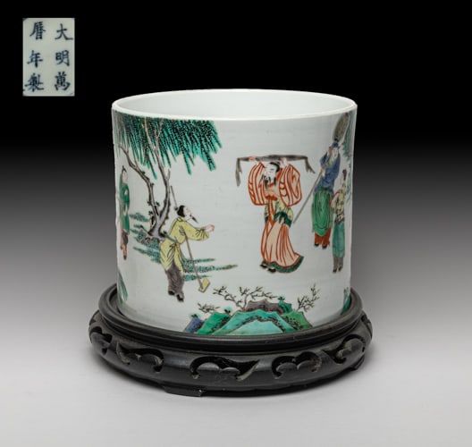 Chinese Famille Rose Porcelain Brush Pot: Of cylindrical form, the exterior painted with figures in various activities in landscape setting with a horse and a bull, with stand. Approx. 7.2-6.2 inch (w/o stand).