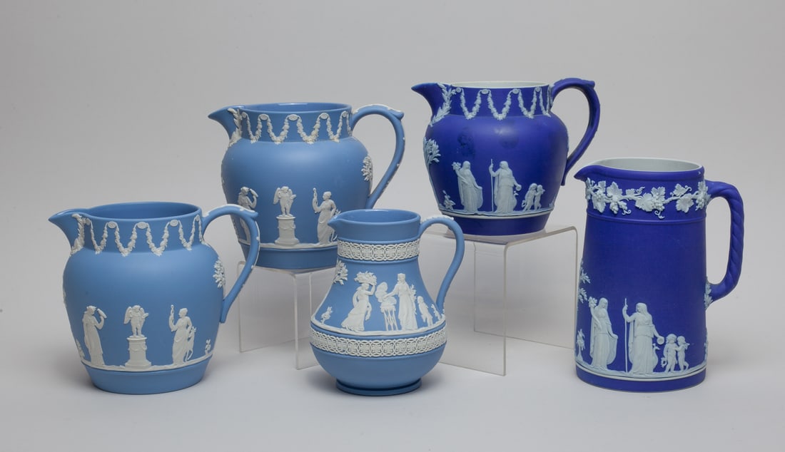 Set Wedgwood Jasper Wares: Group of 5 Wedgwood jasper ware porcelain pitchers, each bottom carved with WEDGWOOD MADE IN ENGLAND. Size varies.