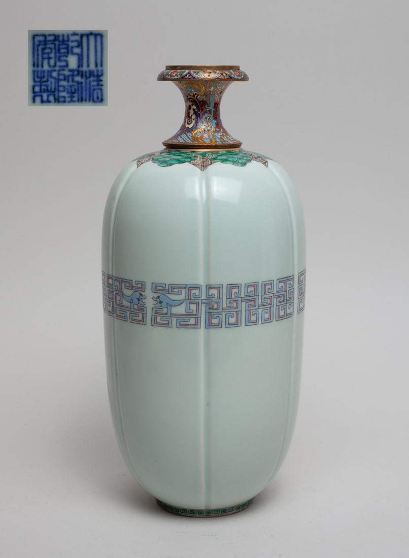 Chinese Export Porcelain Vase w/ Cloisonne Top: The ovoid body of lobed form, decorated with stylized archaistic beasts, set with a waisted cloisonne top, the bottom with a six-character mark. Approx. 11-4.7 inch.