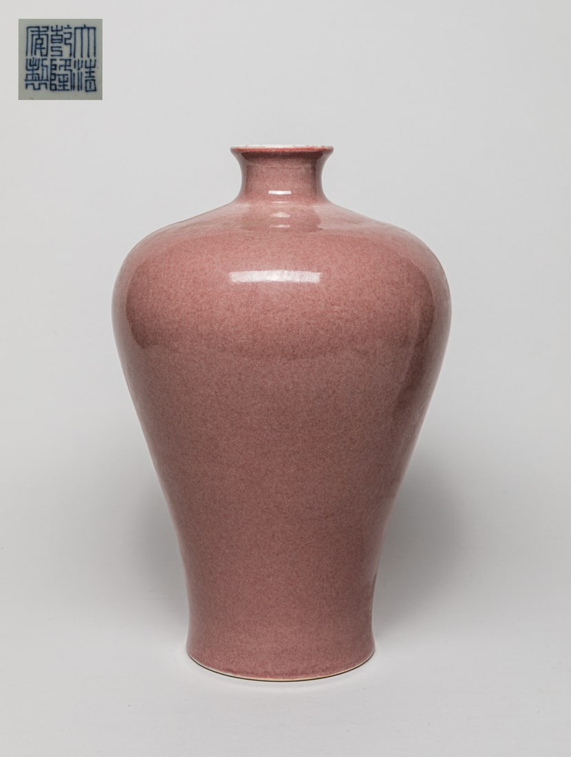 Tall Chinese Red Glazed Porcelain Vase: Of baluster form with a short waisted neck, the exterior applied in soft-red glaze, the bottom inscribed with a six-character mark. Approx. 13.5-8.2 inch.