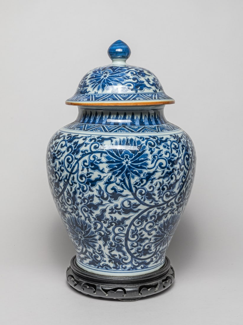 Large Chinese Blue & White Porcelain Vase: The ovoid body and the lid exterior painted with dense meandering lotus sprays. Approx. 16.4-10.5 inch.