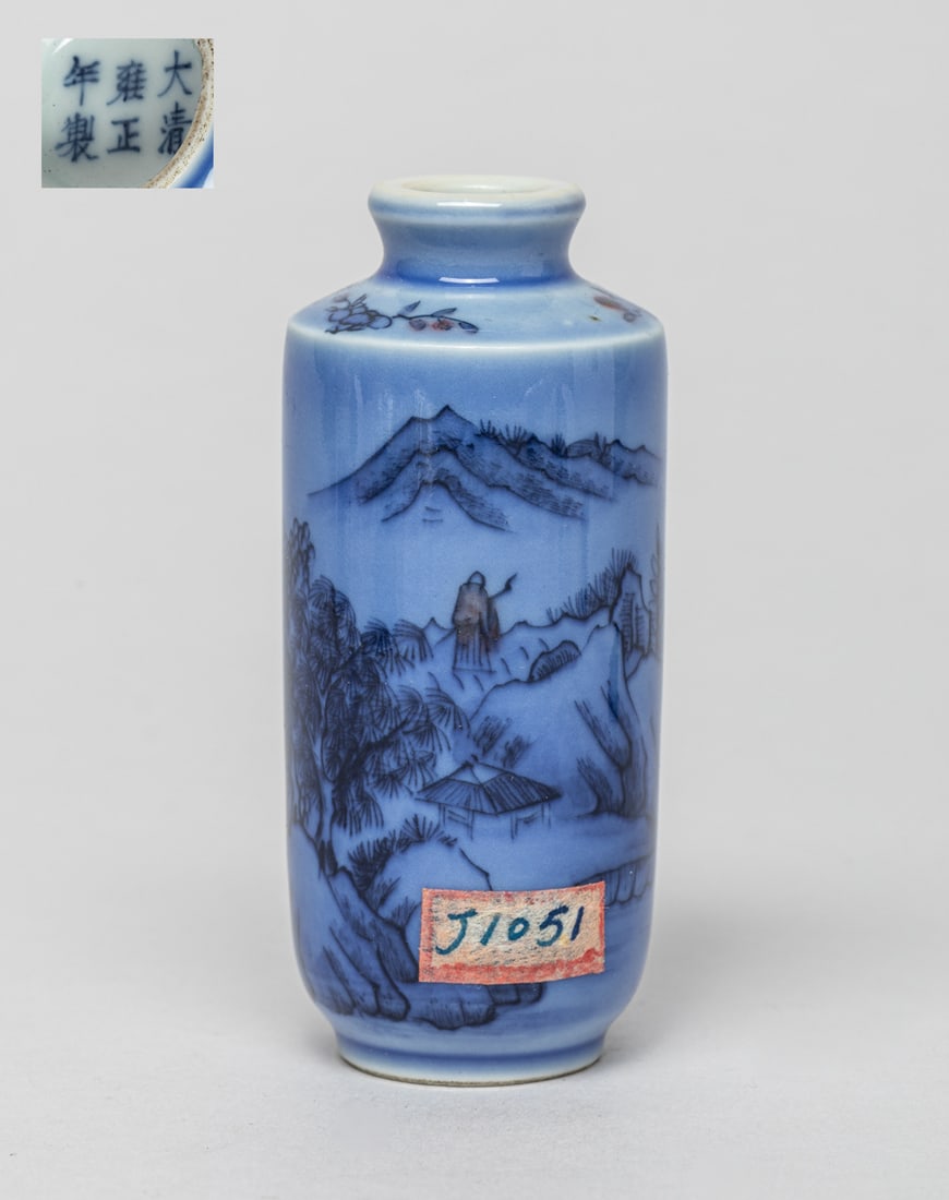 Special Form Chinese Porcelain Snuff Bottle: Chinese porcelain snuff bottle in blue tone, painted with a landscape including mountains, buildings, trees and a figure on a boat in the river, six-character mark at the bottom, stopper missing. Appr