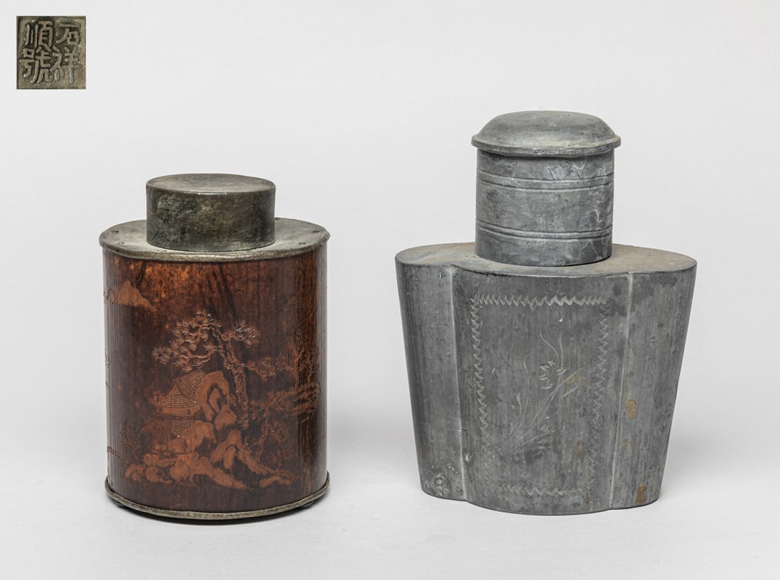 Chinese Bamboo & Pewter Tea Jars: Including one tea jar with bamboo-body carved with a detailed landscape, a seal on bottom. Another tea jar carved with flowers on the body. Approx. 4.6-2.9-6.1 inches (Largest).