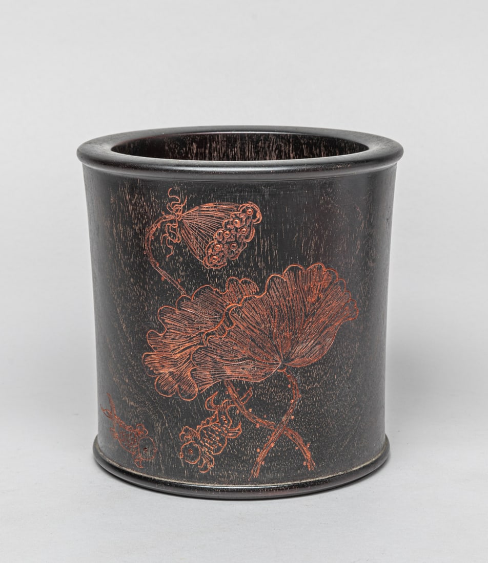 Chinese Carved Wood Brush Pot: A collectible Chinese wood brush pot, carved with a large detailed lotus flower, leaf and two fishes aside. Approx. 6.5-6.5 inches. _x000d__x000d_The Estate of See Long Antiques, LA, 2001.