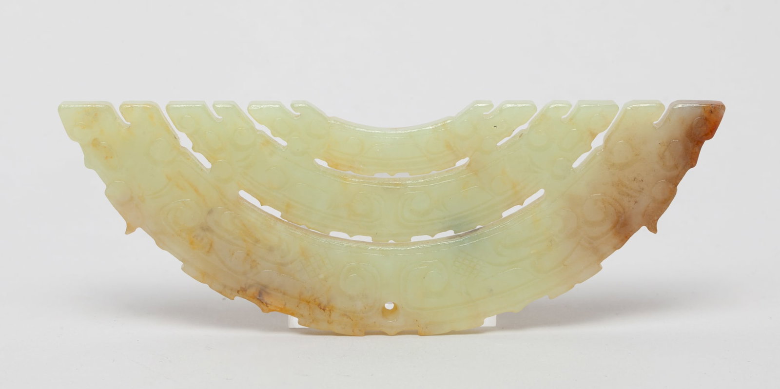 Chinese Jade Carved Plaque: Of curve form, the plaque carved with three connected pieces, each carved in beast form and with motif on both side. Approx. 4.8 inches.