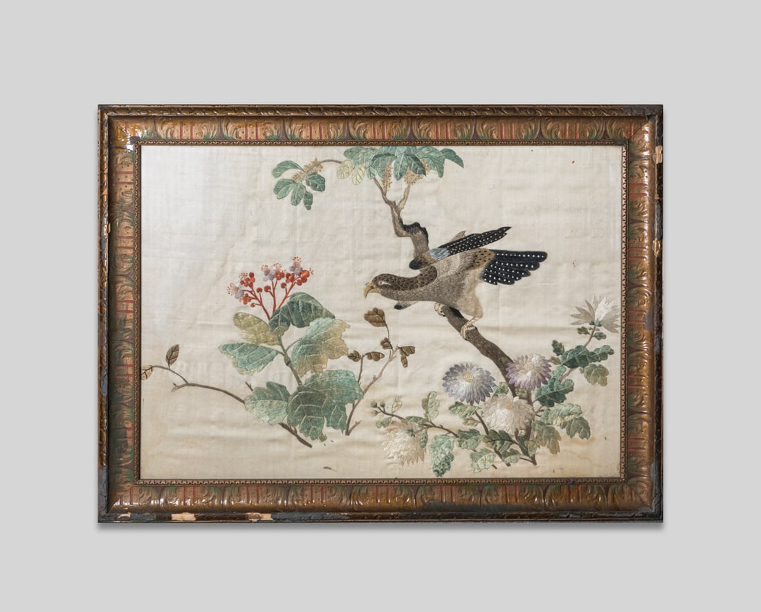 Chinese Embroidered Painting: One collectible Chinese embroidered painting, with a vivid flying bird standing a flower tree branch surrounded by its large leaves and flowers. Approx. 20.5-27 Inches (frame size).