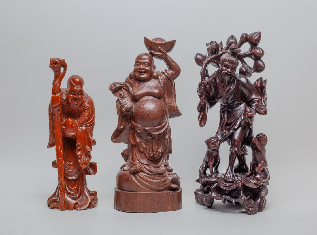 Estate Chinese Wood Figures: Including one Buddha sculpture with one hand hold a treasure up to the head and one hand with a Ruyi, one sculpture of the Old Immortal of the South Pole, and one old male holding a large fruit branch