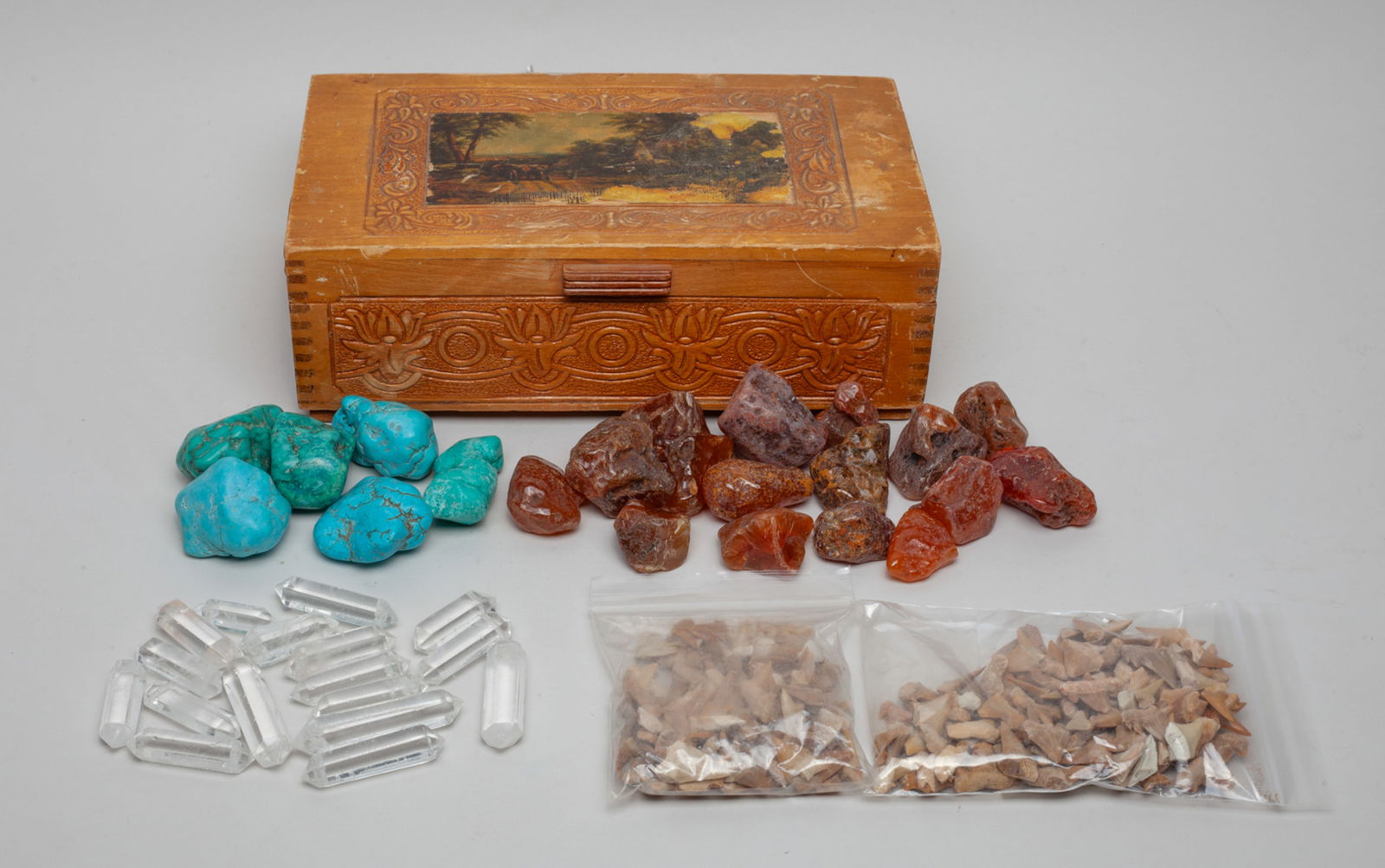 Shark Teeth, Turquoise Like & Agate: Including turquoise-like nuggets, animal teeth, agate nuggets, and crystal points, with a box. Size varies.