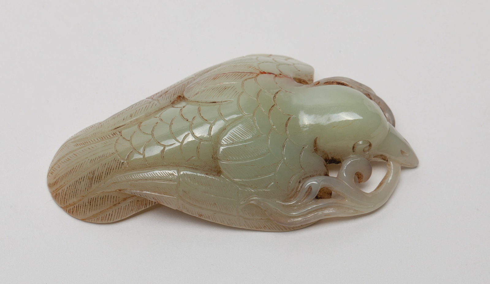 Chinese Jade Carved Bird Holding Flower: The jade featuring a bird with a Lingzhi at the beak. Approx. 3.5-2.0-0.8 inches.
