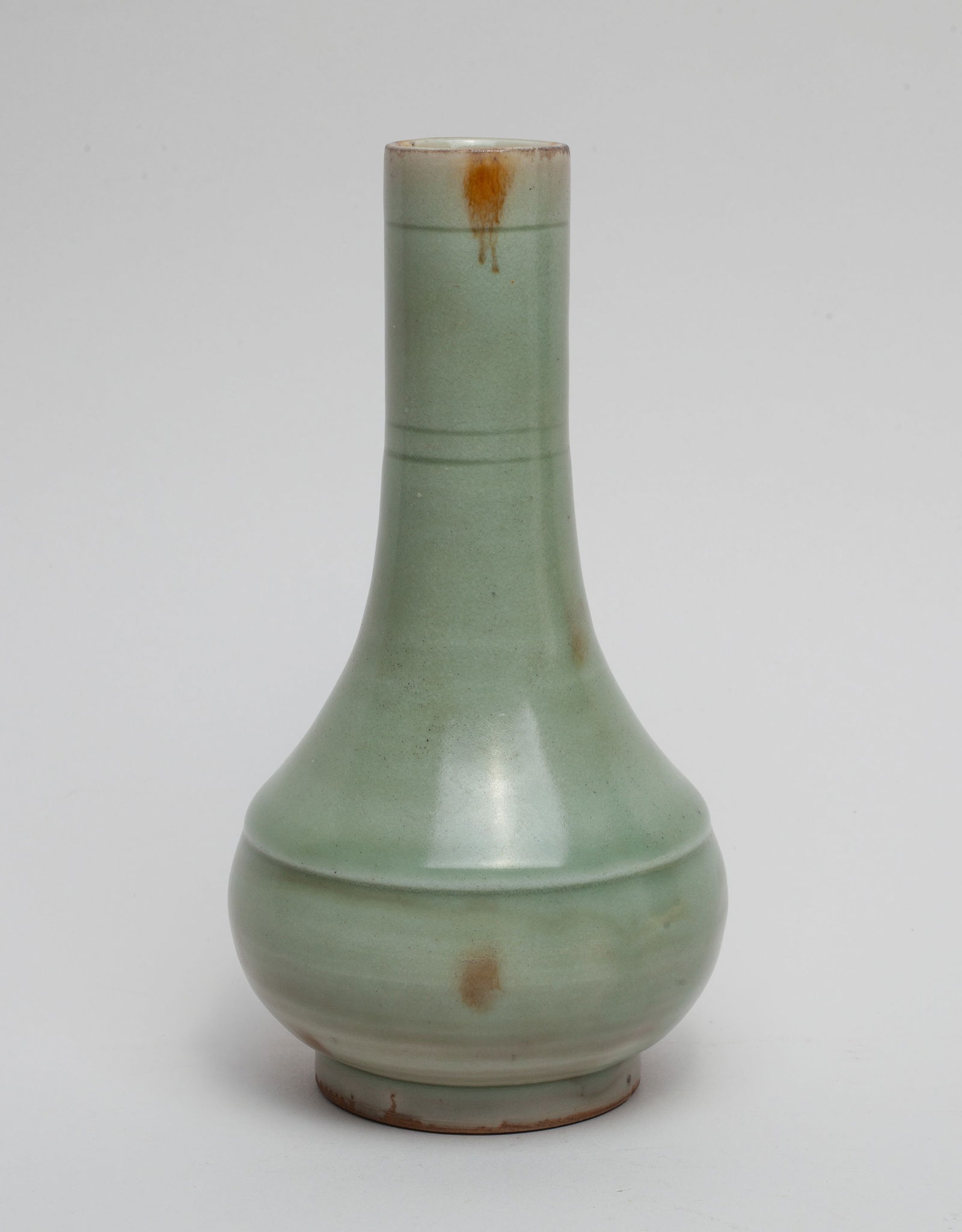 Special Chinese Longquan Porcelain Vase: The Chinese Longquan vase glazed in celadon color. Approx. 3.6-7.0 inches.