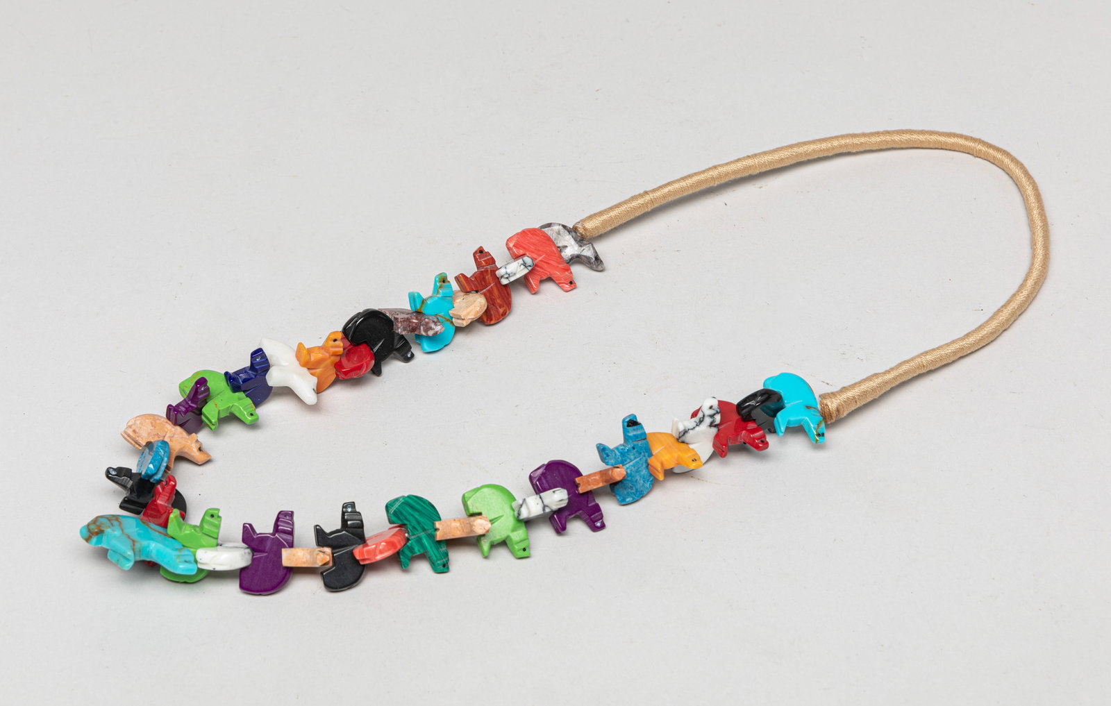 Collectible Zuni Gemstone Necklace: Zuni fetish necklace with multi-gemstone carved bear form pendants. Approx. 26inch L.