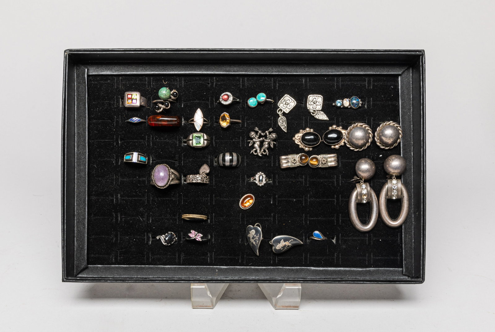Estate Silver Jewelry Sets: A large group of rings and earrings, some pieces marked 925 or STERLING, with a case. Size varies.