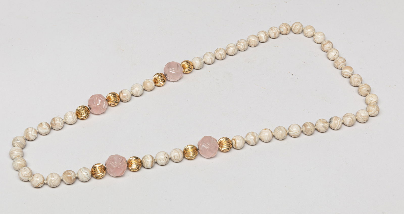 Designed Fossil & Quartz Necklace: Special long fossil and quartz bead bead necklace. Approx. 32inch L.