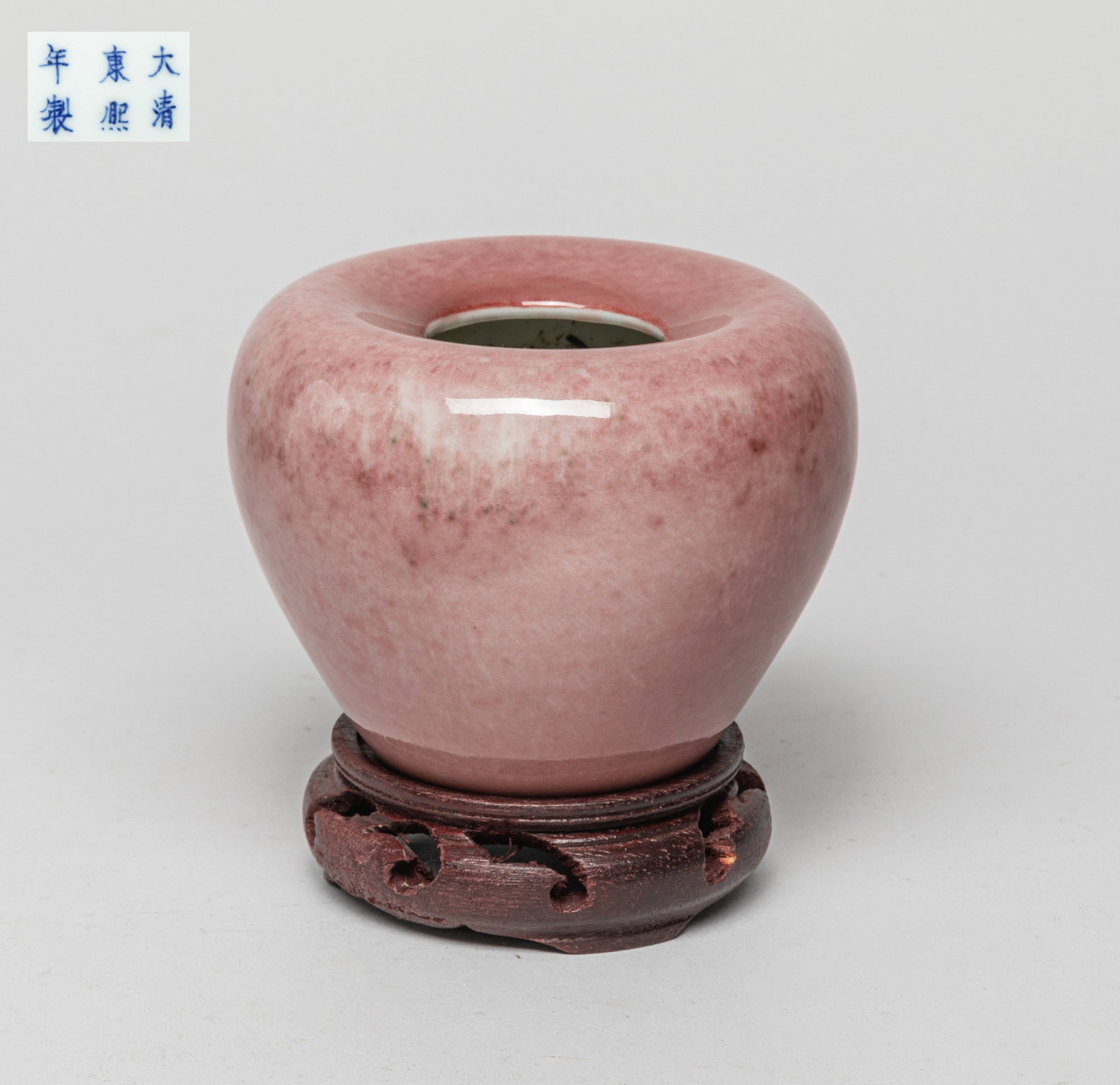 Estate Chinese Porcelain Water Pot: The water pot exterior covered in soft red glaze, the bottom marked with six characters, with stand. Approx. 4*3 inch (w/o stand).