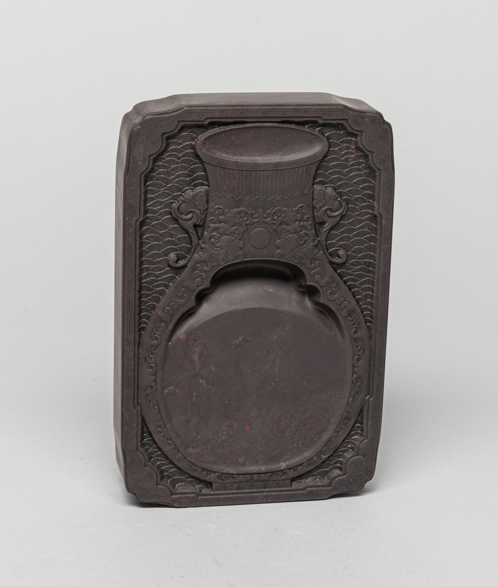 Collectible Chinese Ink Stone: The ink stone surface carved in the form of a baluster vase, the tapering body with a shallow recess forming the well. Approx. 5.8-0.8 inches