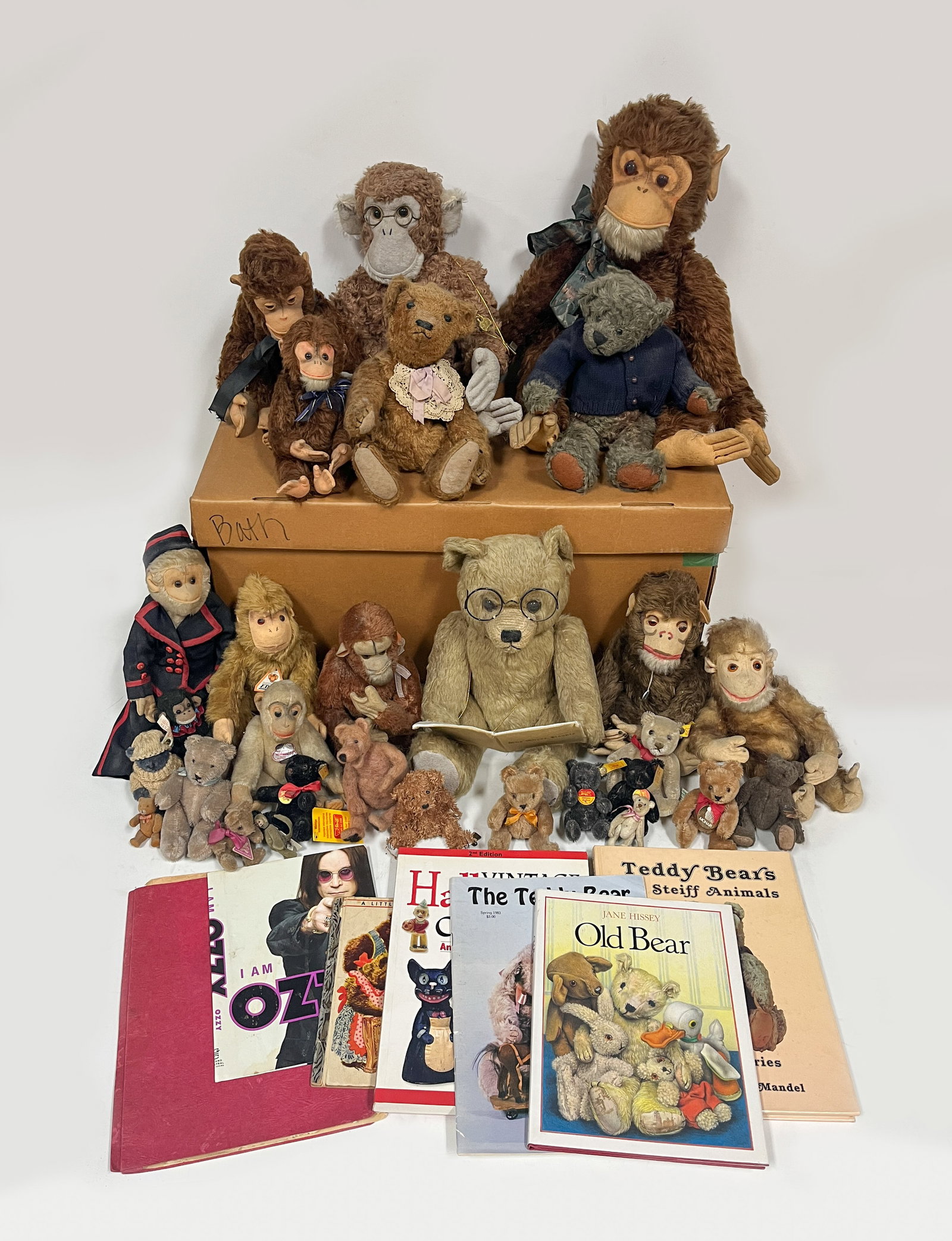 Large Set Monkey Toys: Large group of toy monkeys and bears, with books. Size varies.