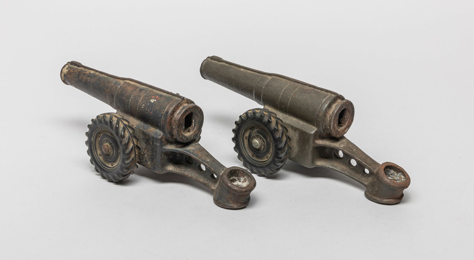 Two Antique Toy Sculptures: Two antique cannon toy table sculptures. Approx. 8.6*3.3*3 inch (each).