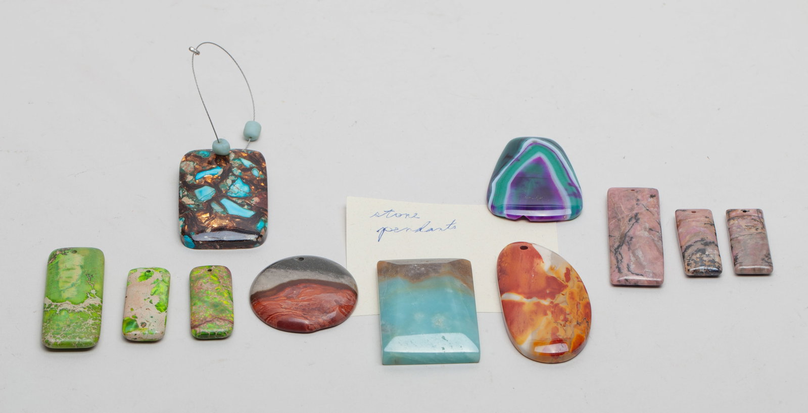 Wonderful Banded Agate Pendants: Collection of banded agate and colored gemstone pendants. Size varies.