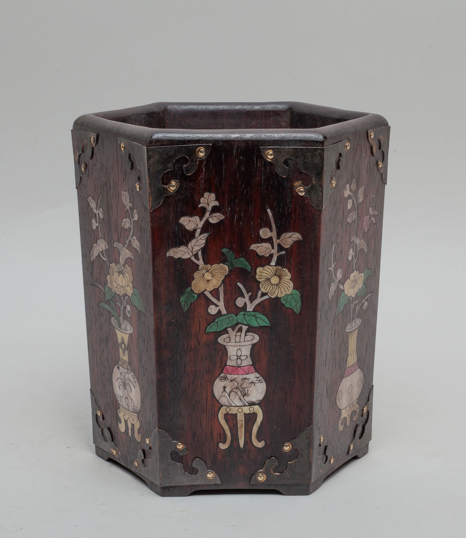 Chinese Hardwood Brush Pot Inlaid MOP: Of hexagonal section, each side inlaid with mother-of-pearl as flowers in vase. Approx. 6.4*5.6*7.2 inch.