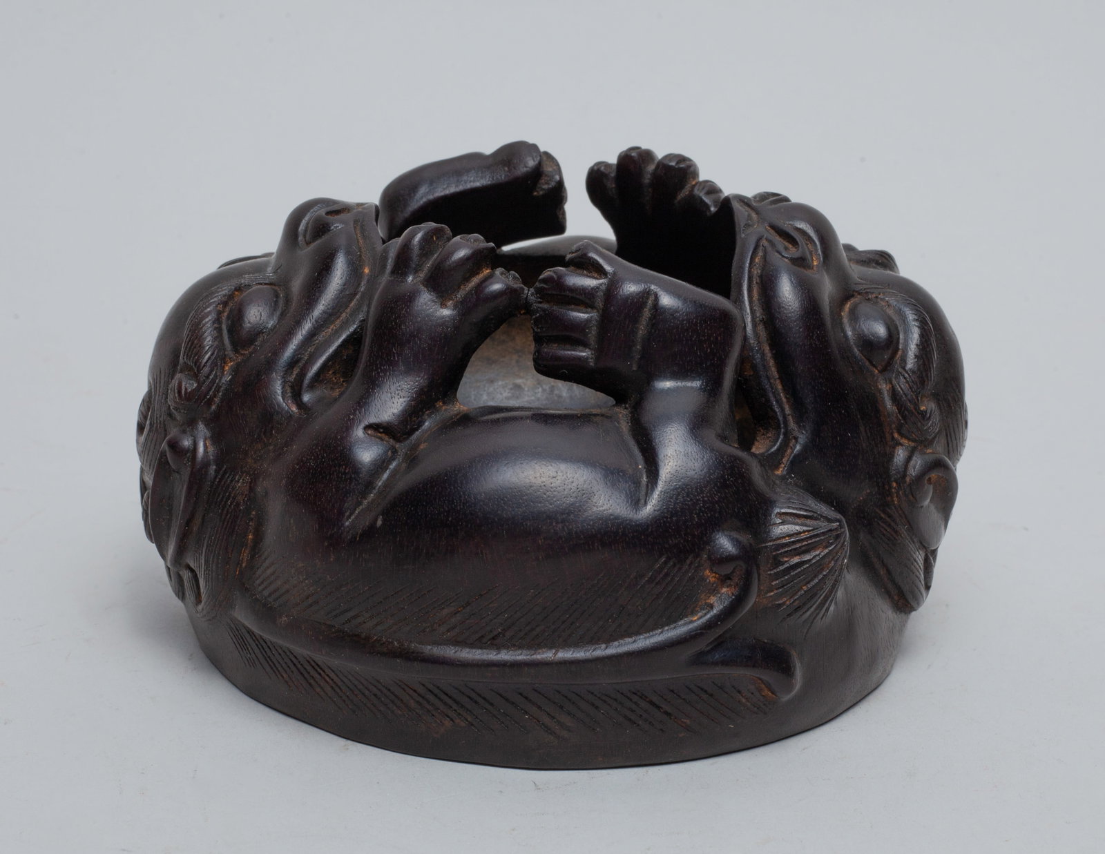 Chinese Wood Carved Beast Piece: Special form Chinese wood piece, carved as a pair of beasts with joint body and legs. Approx. 4.8*4.5*2.6 inch.