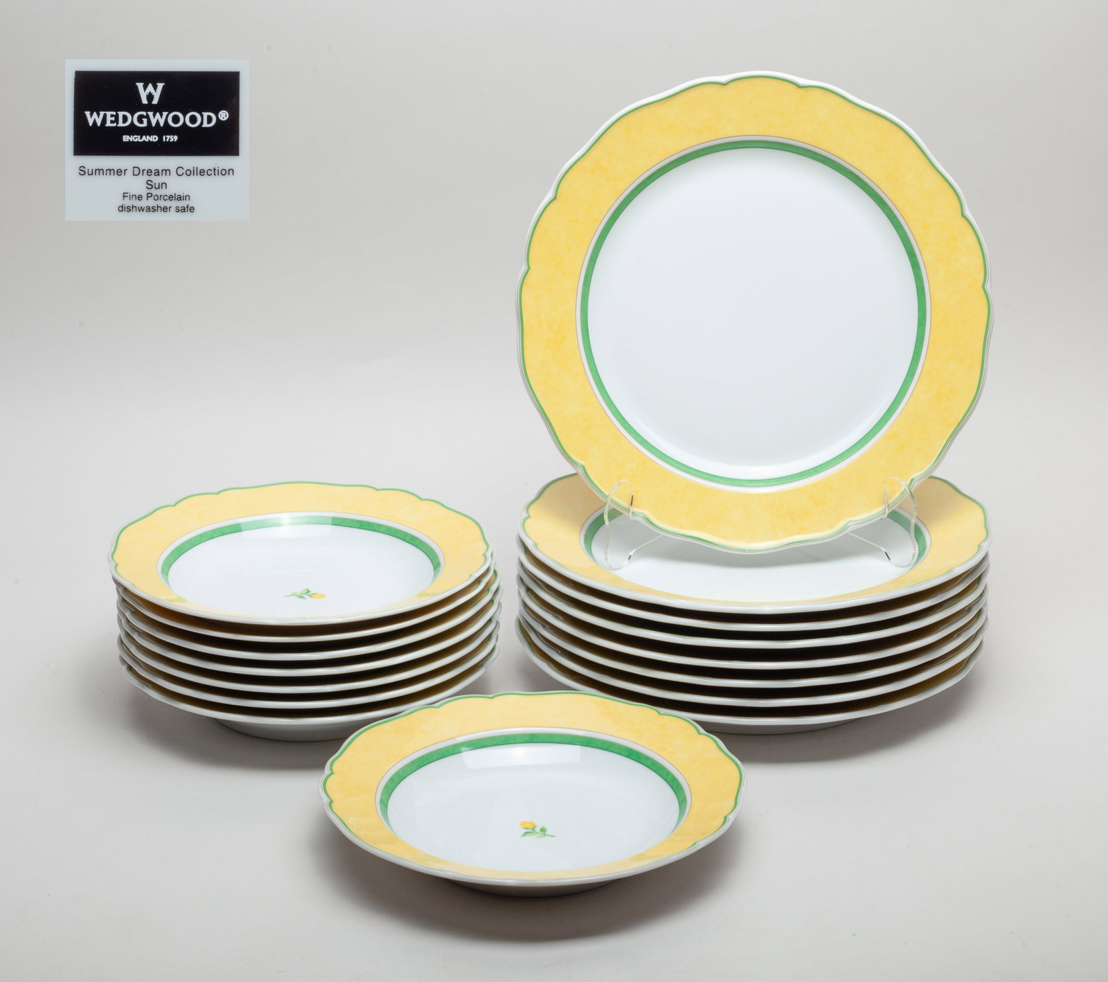 Estate Wedgewood Porcelain Plates: Set of 16 porcelain plates, each bottom marked WEDGWOOD ENGLAND 1759 Summer Dream Collection Fine Porcelain dishwasher safe. Approx. 10.6inch D (larger plate).