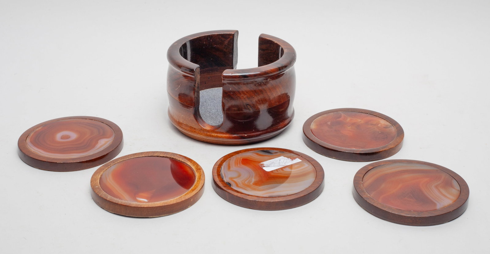 Vintage Carnelian Banded Agate Cup Stands: Set of 5 vintage Carnelian banded agate cup stands of circular shape, with case. Approx. 4.8*2.9 inch (case size).