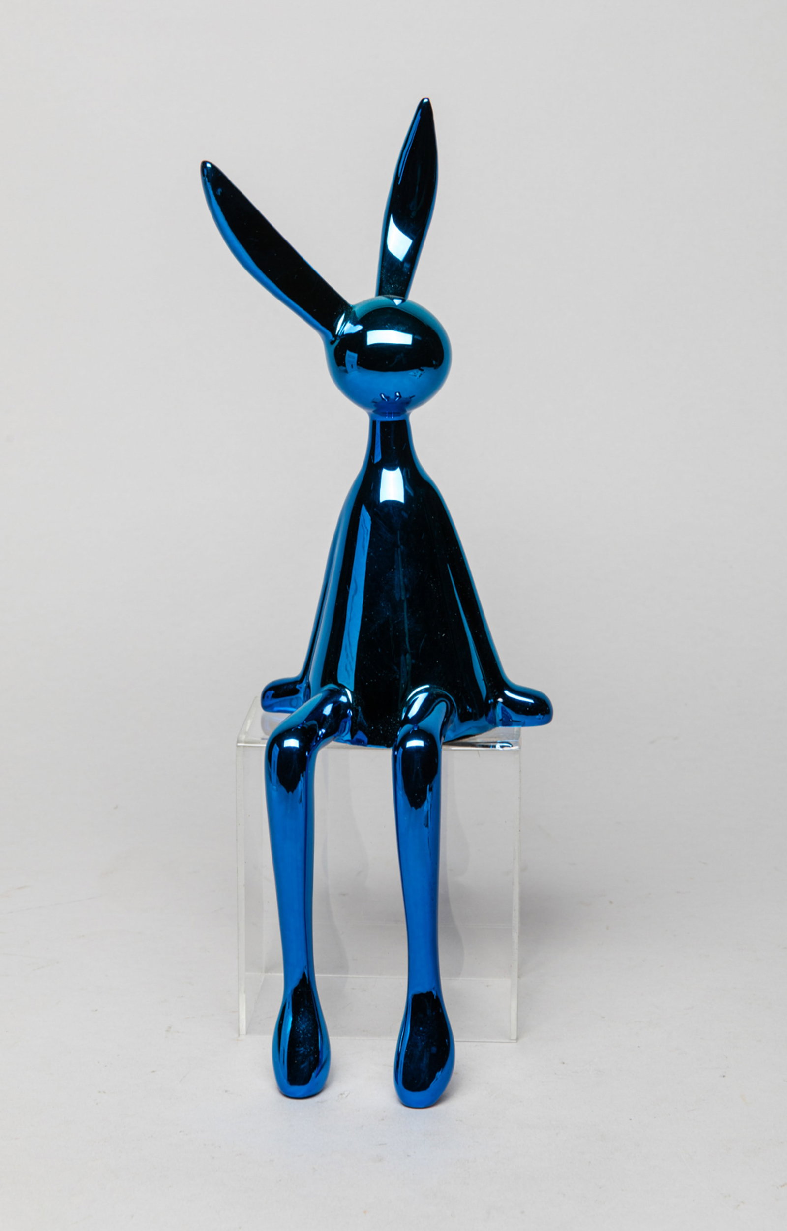 Mid-century Art Sculpture: Blue-color art sculpture of special rabbit form. Approx. 10.5*3.3*3.3 inch.