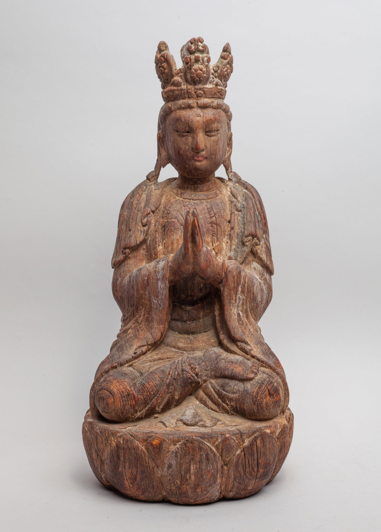 Chinese Wood Carved Sculpture of Buddha: The wood Buddha carved seated on a lotus base, the hands in namaskara mudra, wearing a loose-fitting robe and an elaborate throne. Approx. 15.7*7.3*3.7 inch.