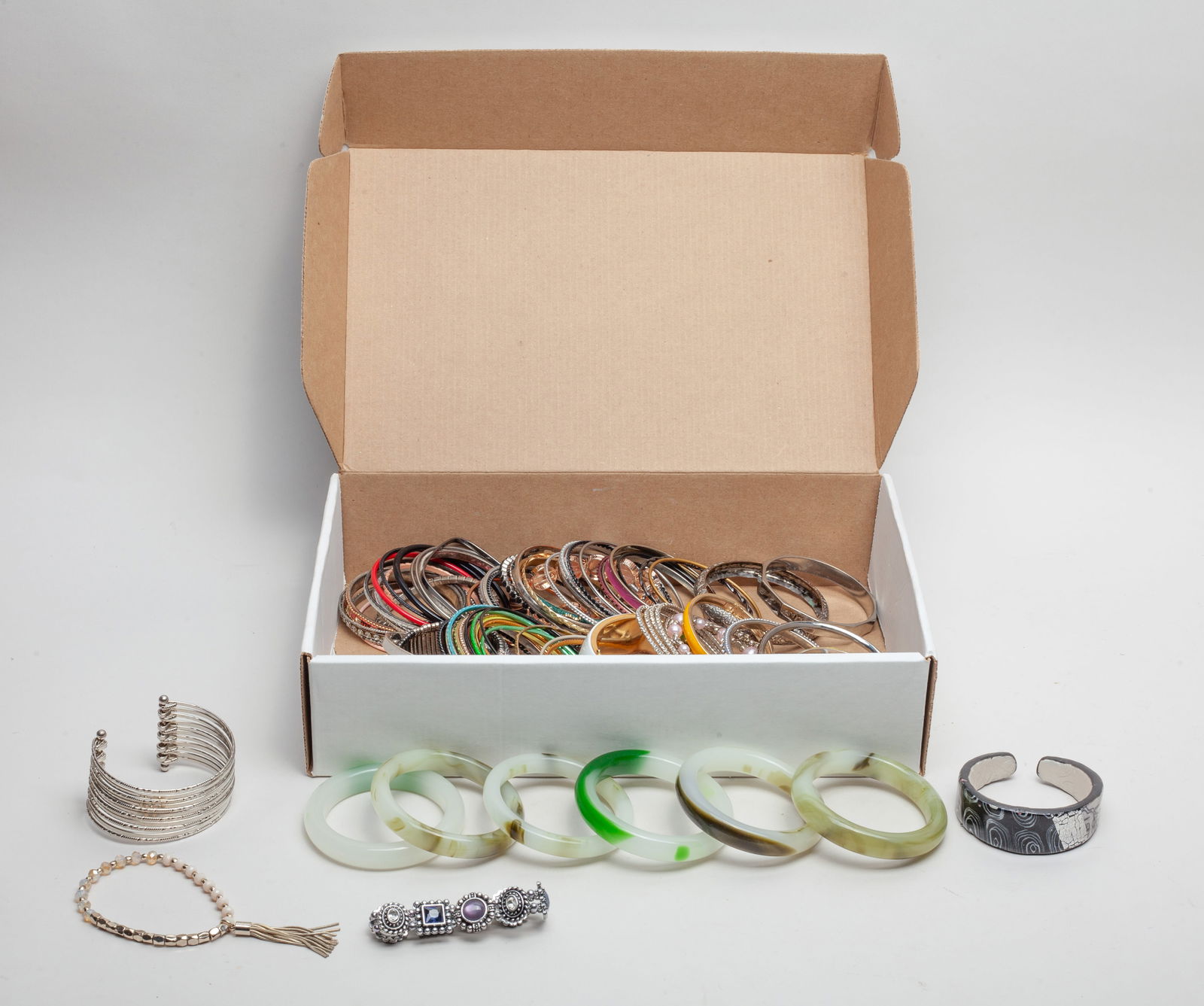 Estate Box of Bangles: Estate large set mixed bangles, including metal, decors & Chinese Peiking glass. Size varies.