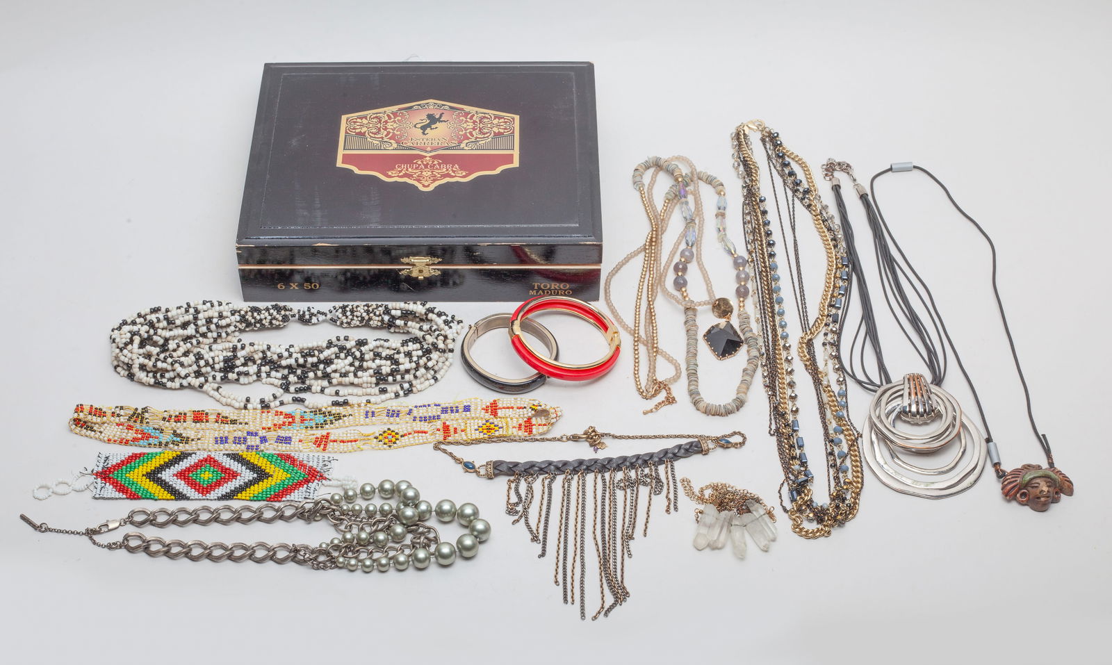East West, African Tribe Jewelry Collections: African tribe style necklaces, bangles and bracelet, with a box. Approx. 9.6*7.6*2 inch (box size).