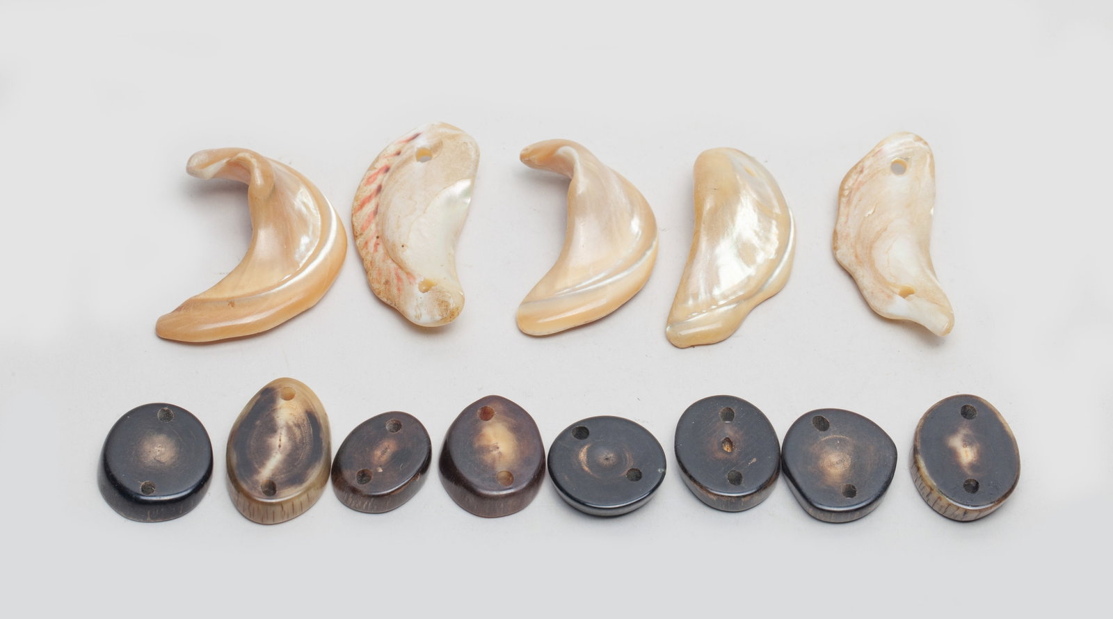 Tibetan MOP & Horn Pendant Beads: Including 8 Tibetan horn carved disc beads and 5 mother-of-pearl carved pendants. Approx. 1.75*1.3 inch (largest).