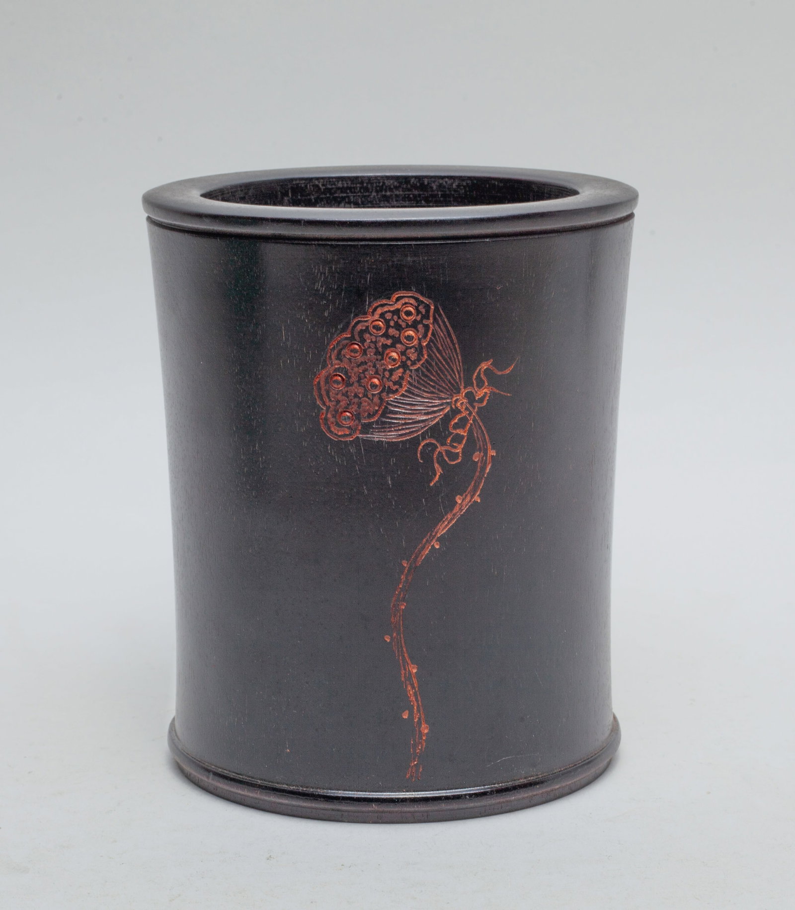 Chinese Hardwood Brush Pot: Of cylindrical form, carved in low relief with a lotus seedpod. Approx. 5.1*4.35 inch.