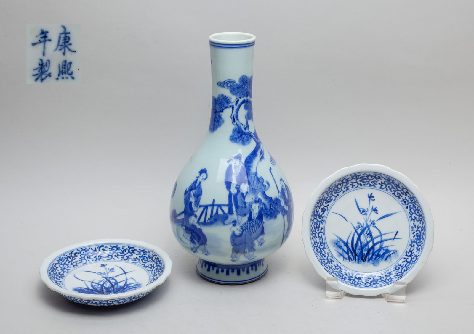 Estate Chinese Porcelain Vase & Plates: The vase exterior painted with figures in various activities in landscape setting, the bottom marked with four characters, the plates interior center painted with blossoming orchids, the sides with de
