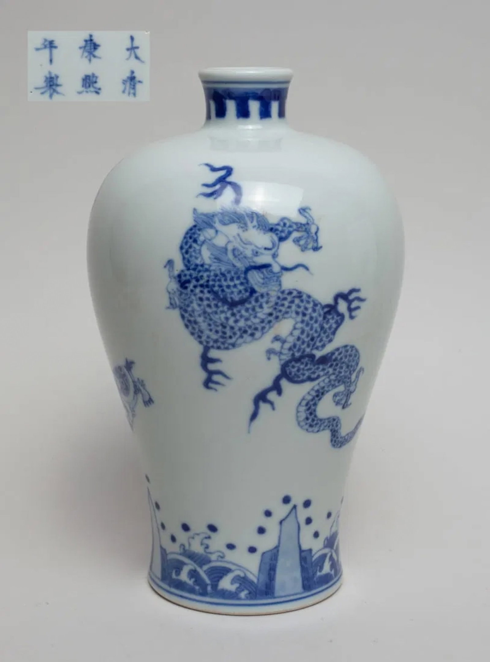 Chinese Blue & White Porcelain Cabinet Vase: Of waisted baluster form, decorated with dragon, phoenix, tiger, qilin and tortoise above waves, the bottom marked with six characters. Approx. 8.2-4.8 inch.