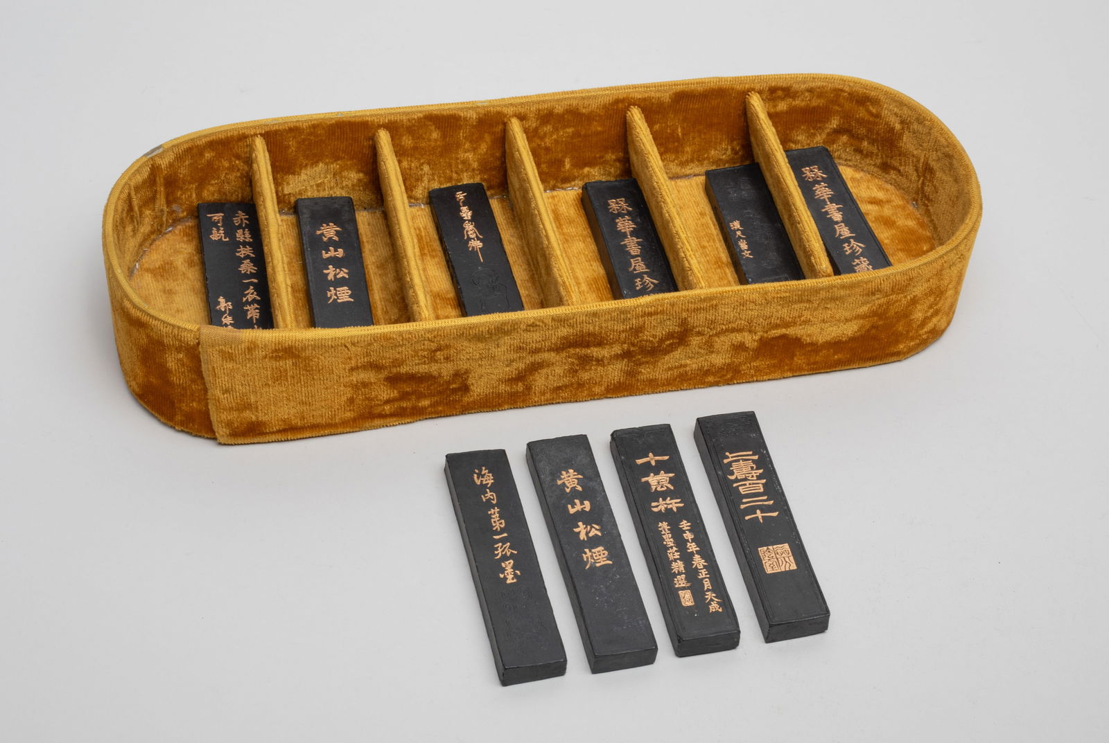 Estate Chinese Ink Sticks: Group of 10 Chinese ink sticks, carved with dragon, bird, landscape, Buddha, archaic motif or characters, with case. Size varies.