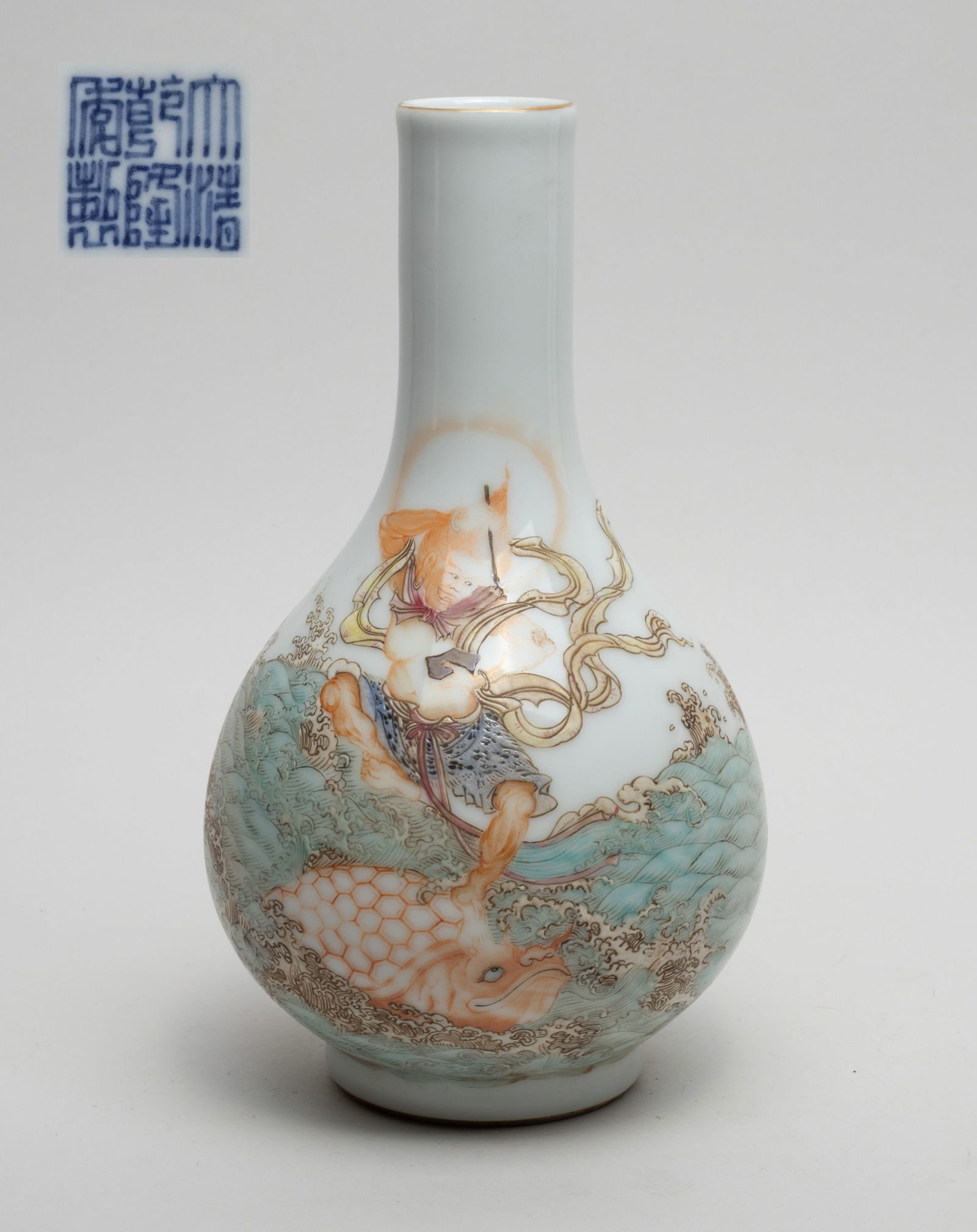 Chinese Famille Rose Porcelain Vase: Finely potted with pear-shaped body rising from a short foot to a cylindrical neck, expertly painted and enameled around the exterior with Kui Xing riding the back of the mythical turtle, his right ar