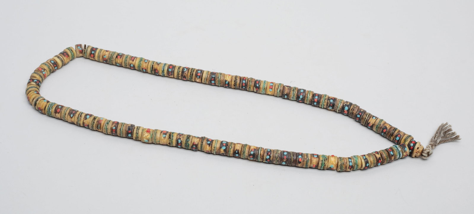 Chinese Tibetan Bone Bead Necklace: Collectible Chinese Tibetan bone carved disc bead necklace. Approx. 28 inch L.