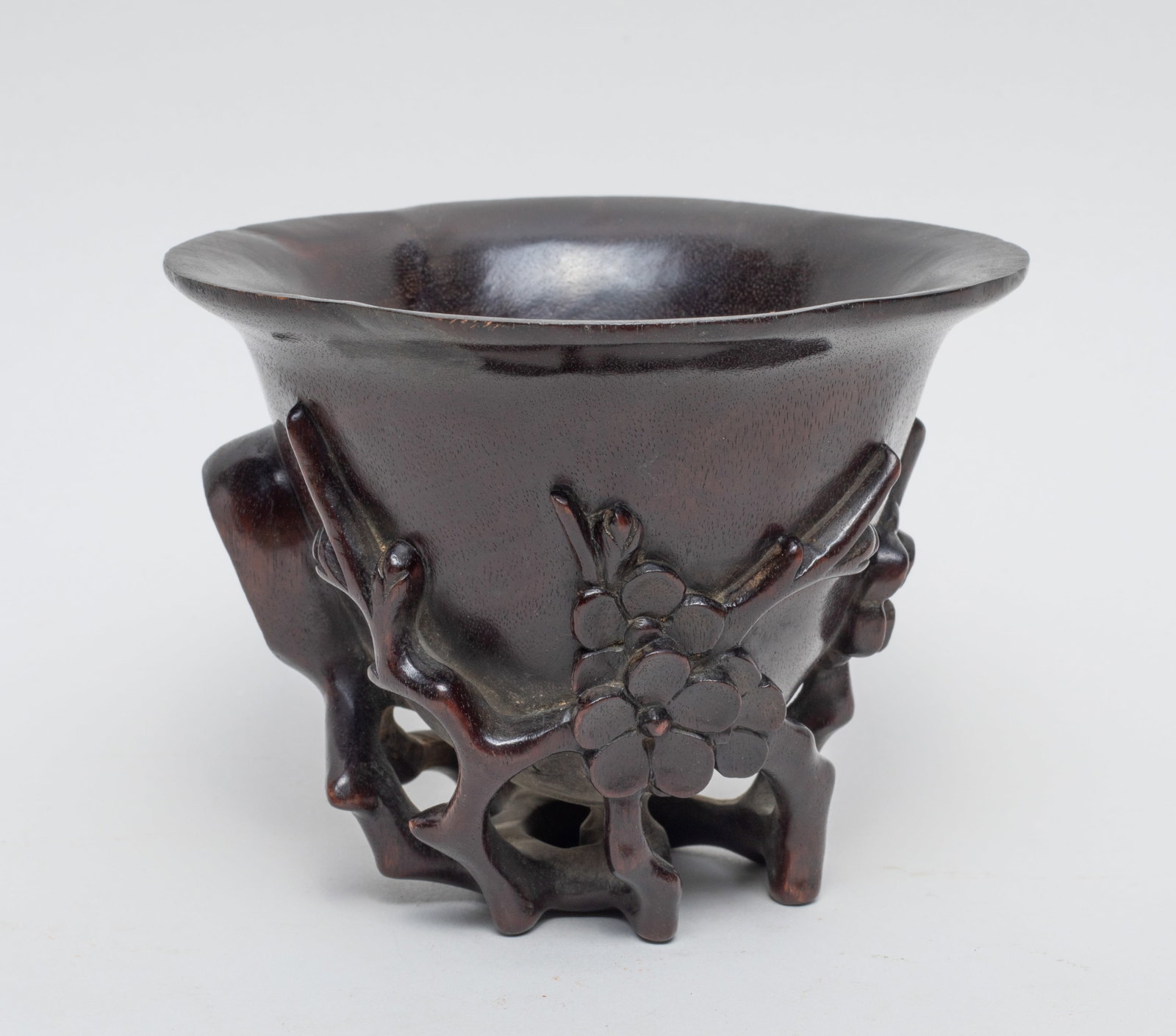 Chinese Zitan Wood Cup: The wood cup with lobed rim, carved and reticulated with gnarled blossoming stem forming the base. Approx. 4.4*4.2*3.4 inch.