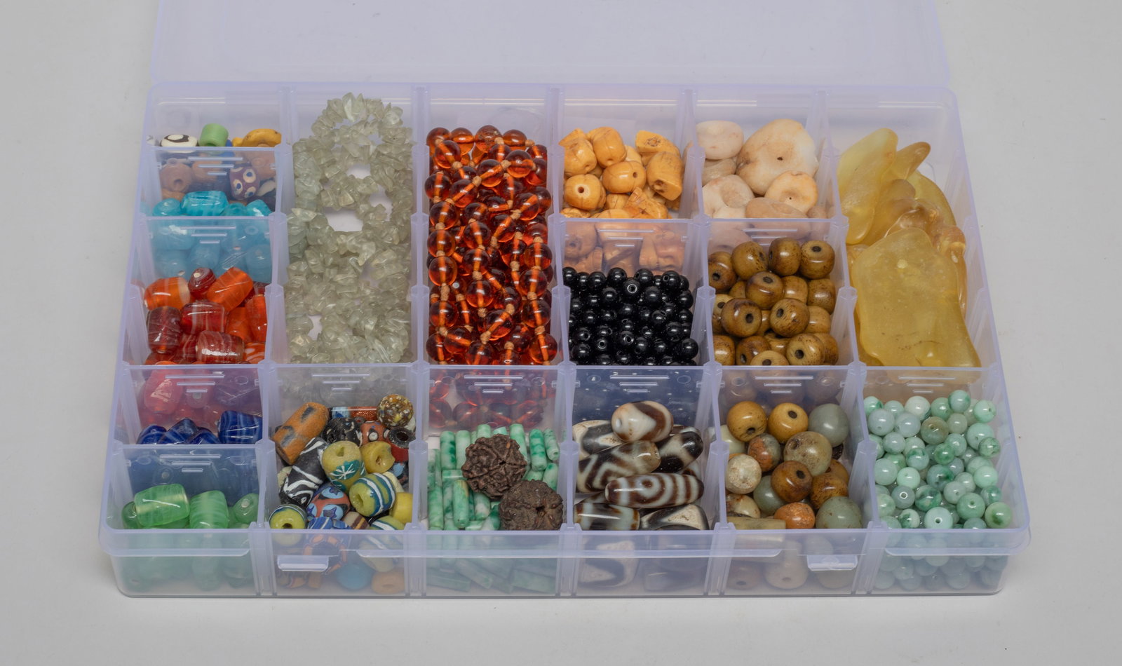 Estate Chinese Mixed Beads Collection: Large group of Chinese glass, stone, agate, bone beads and amber-like pieces, with box. Size varies.