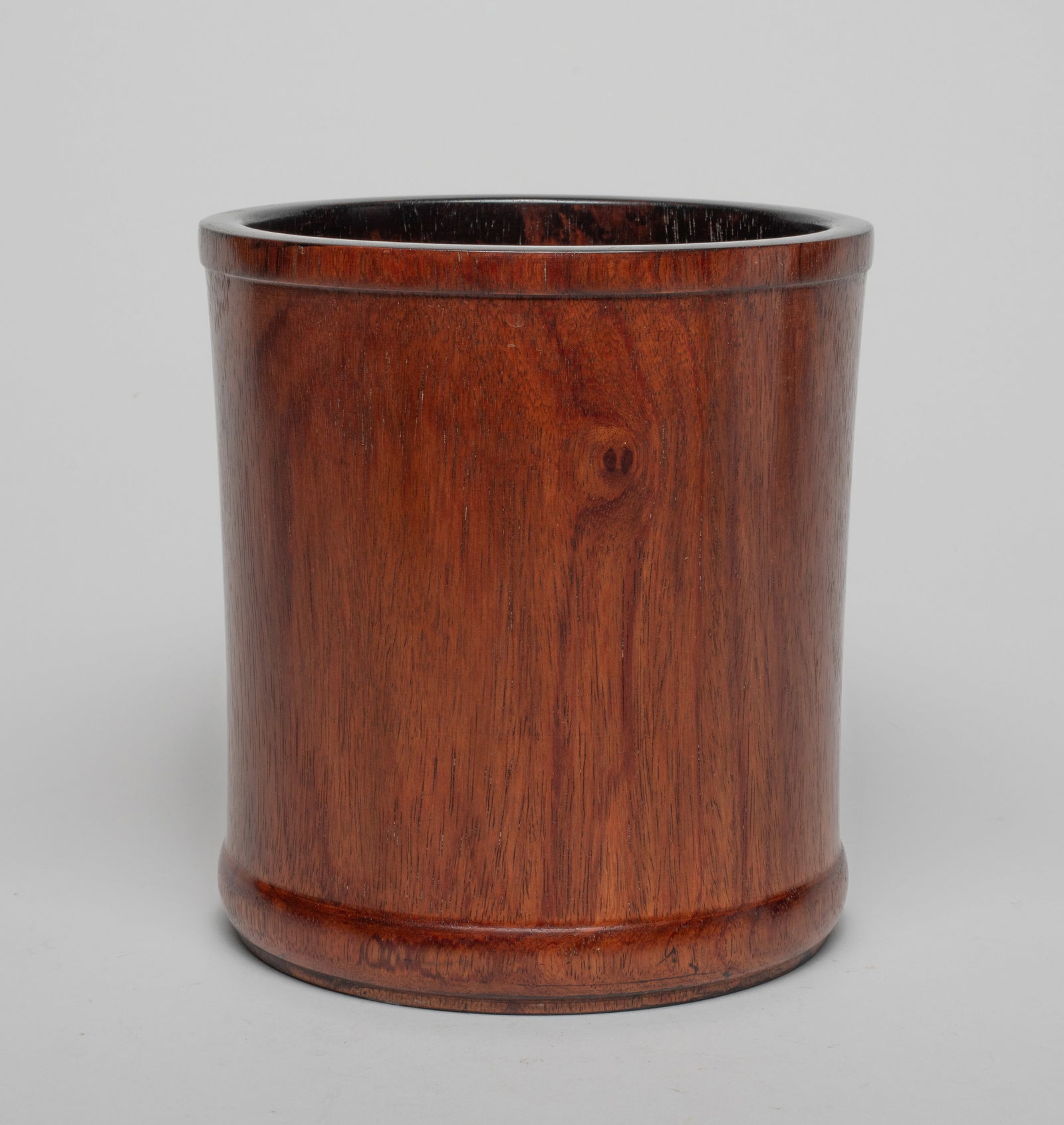 Chinese Wood Carved Brush Pot: Chinese wood brush pot of cylindrical form, the bottom pierced with an aperture and set with a stopper. Approx. 6.8*6.3 inch.