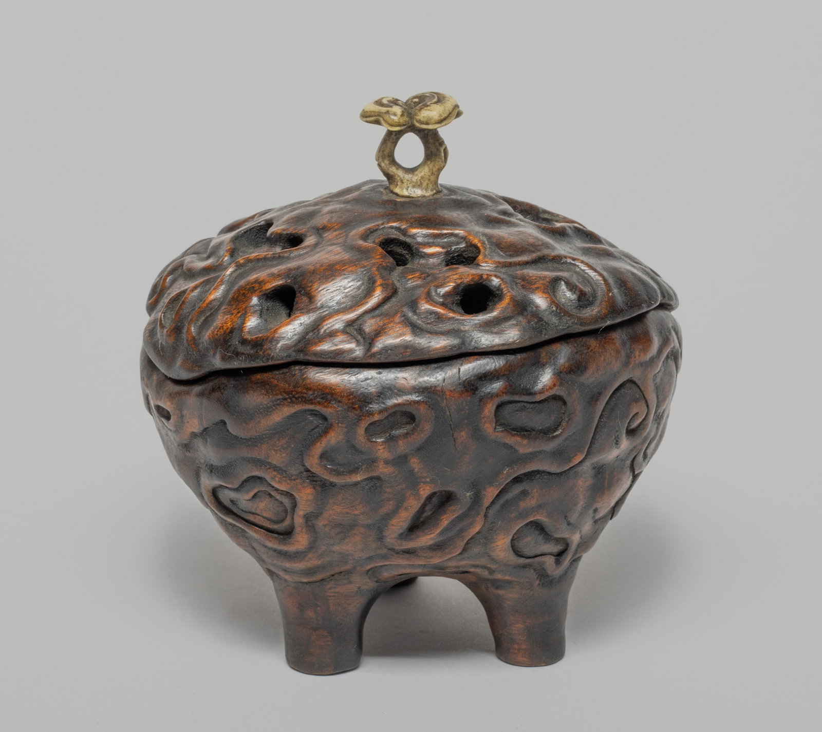Chinese Bark of Agarwood Covered Censer: Special form bark of agarwood censer carved in branch burl form, the reticulated cover set with a lingzhi form knob. Approx. 4.3*3.9*4.4 inch. The Estate of the Little Tokyo, LA, 2019.