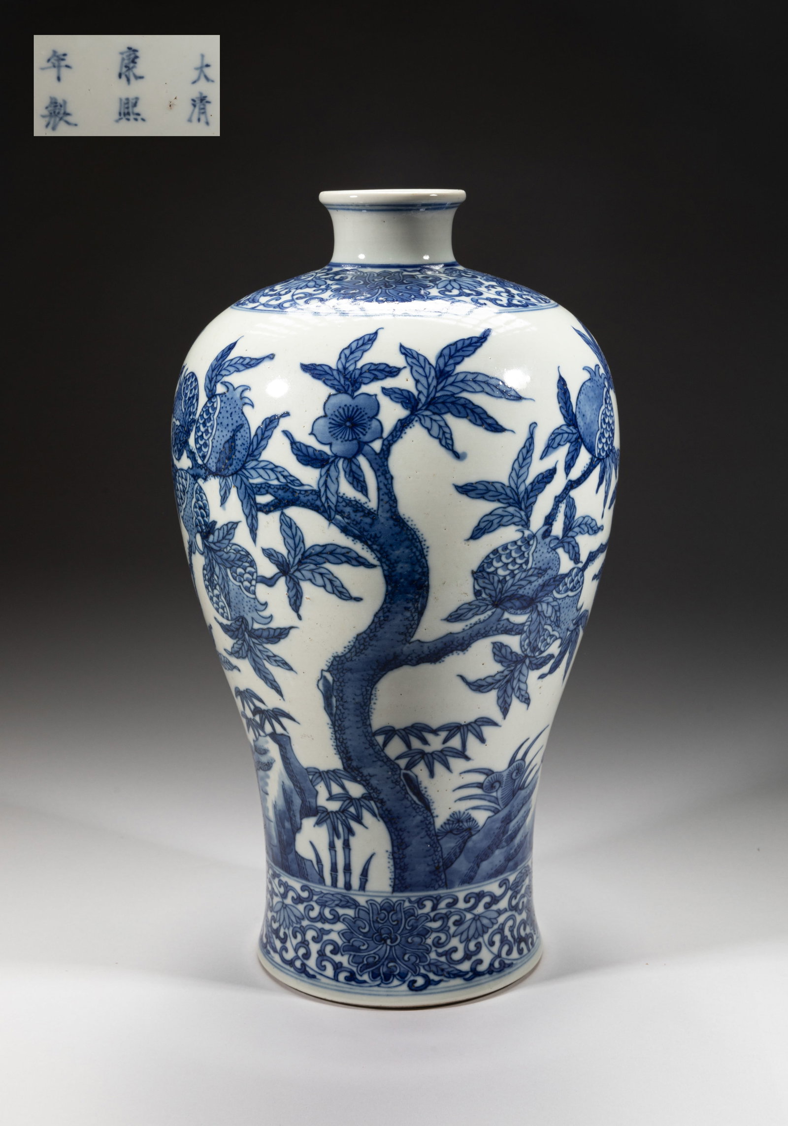 Large Chinese Blue & White Porcelain Vase: Of baluster form, decorated with a blossoming and fruiting leafy pomegranate tree growing from rocks, with bamboo and lingzhi, interspersed with three bats, between borders of lotus scrolls, the botto