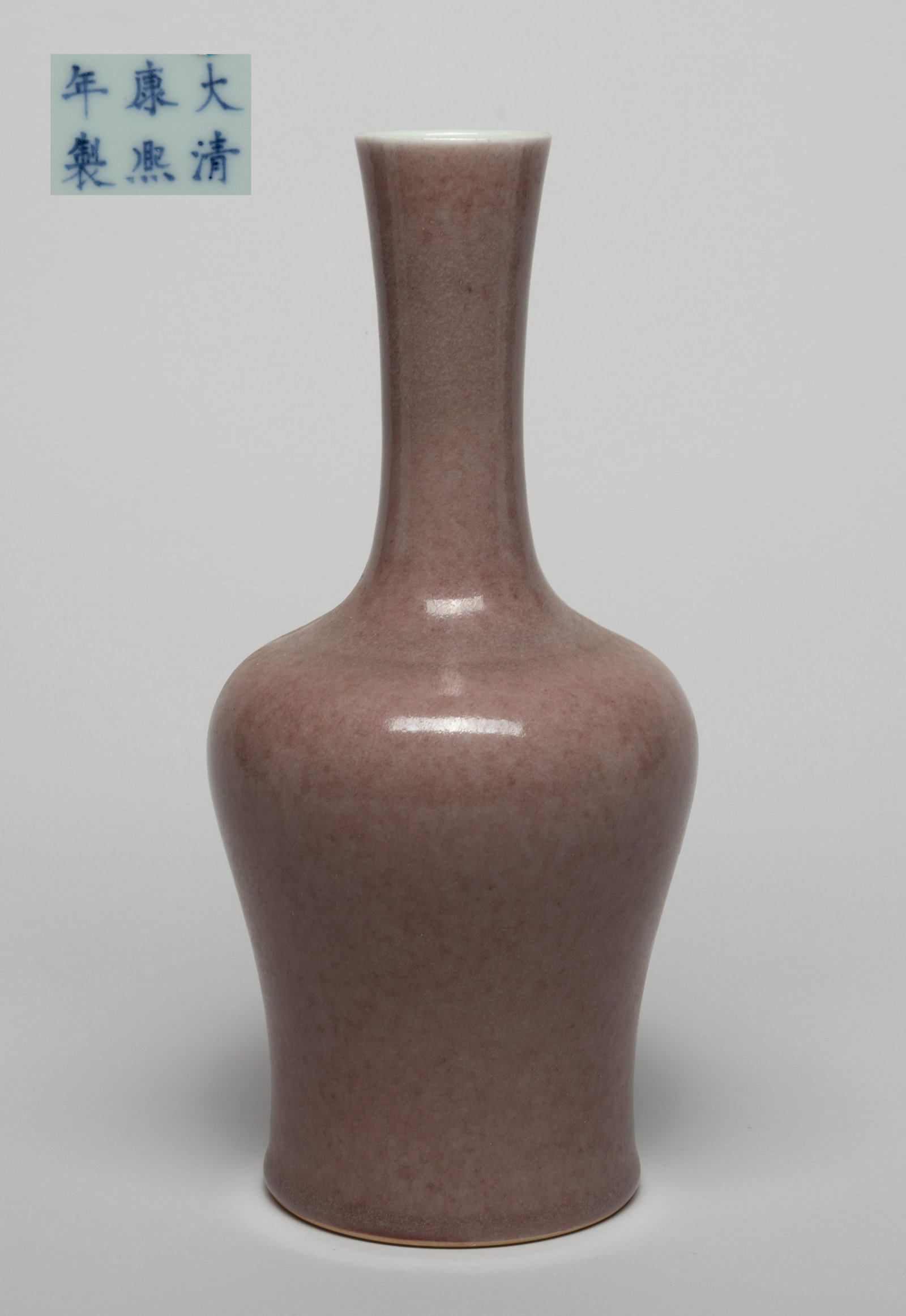 Chinese Export Flambe Glazed Porcelain Vase: Of waisted ovoid form with a gently flared neck, the exterior covered in pale gray-red glaze, the bottom marked with six characters. Approx. 10.1*4.6 inch. The Estate of the F. T Chung, Palm Spring , 