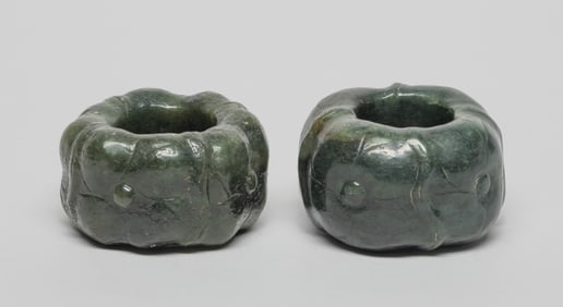 Two Chinese Celadon Jade Thumb Rings